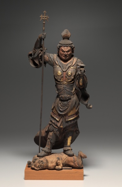 Kamakura wood Bishamonten in gold polychromy. Tang-style cuirass; stupa in the left hand, multi-pronged staff in the right, both feet planted on a prone demon.