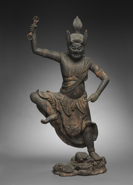 Kamakura 1200s wood Zaō Gongen with traces of red-orange polychromy, 107 cm. Single wrathful face; flame-shaped crest; right arm raises a three-pronged vajra.