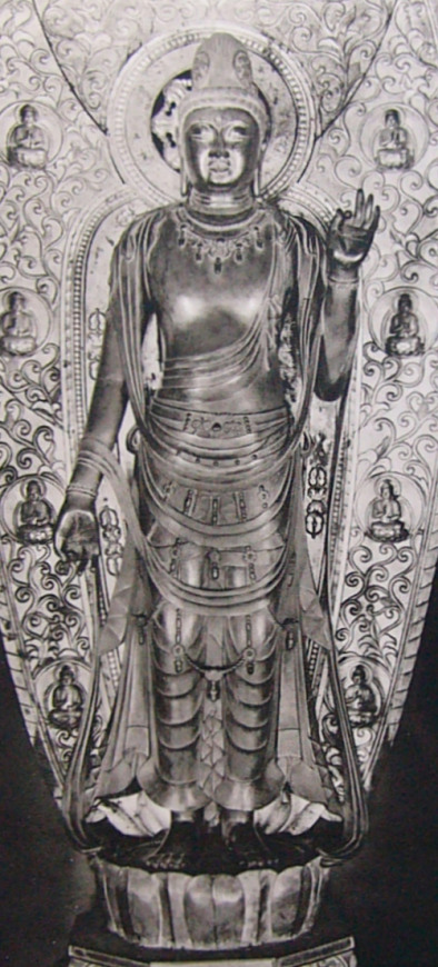 Yakushi-ji Tōindō Shō Kannon, Hakuhō–early-Nara gilt bronze, 189 cm. Single face, two arms; left hand holds the water-vase (kundikā); right hand at chest in a gentle gesture.