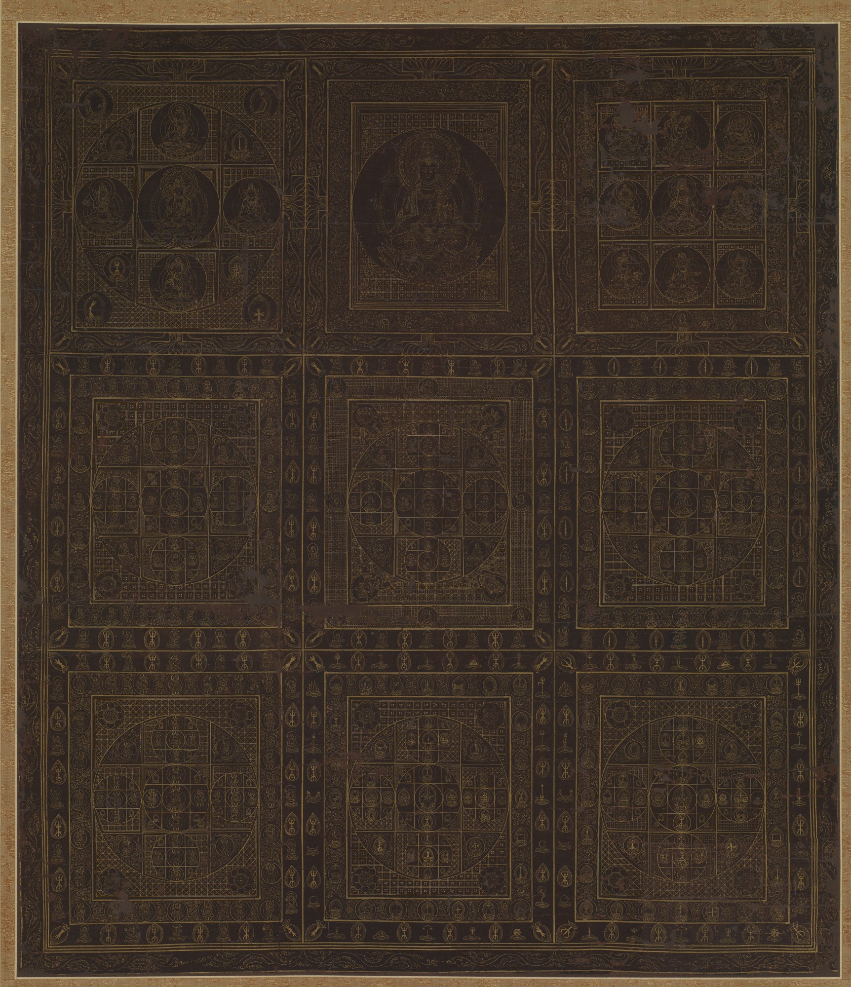 Heian–Kamakura 12th-c. hanging scroll, gold line on purple-dyed silk, 167 × 82 cm. Diamond-World (Kongōkai) mandala in the canonical Genzu nine-assembly grid layout.