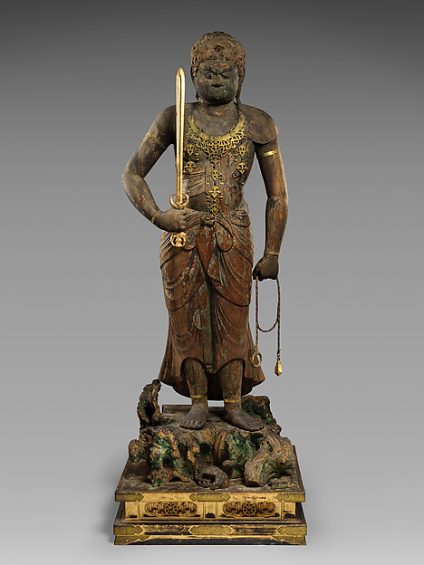 Late-Heian standing wood Fudō Myōō, 12th c., 162 cm, six-block yosegi. Wrathful face: tenchigan eyes, opposed fangs, henpatsu braid; sword and lasso.