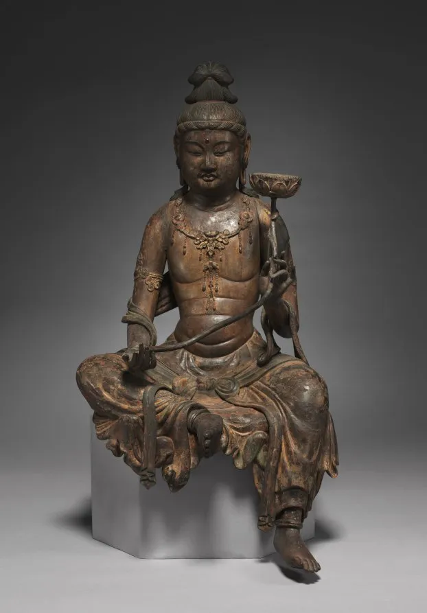 Kamakura mid-1200s seated wood bodhisattva in royal-ease (lalitāsana). Worn polychromy with surviving cut-gold kirikane on headband, armbands, necklace.