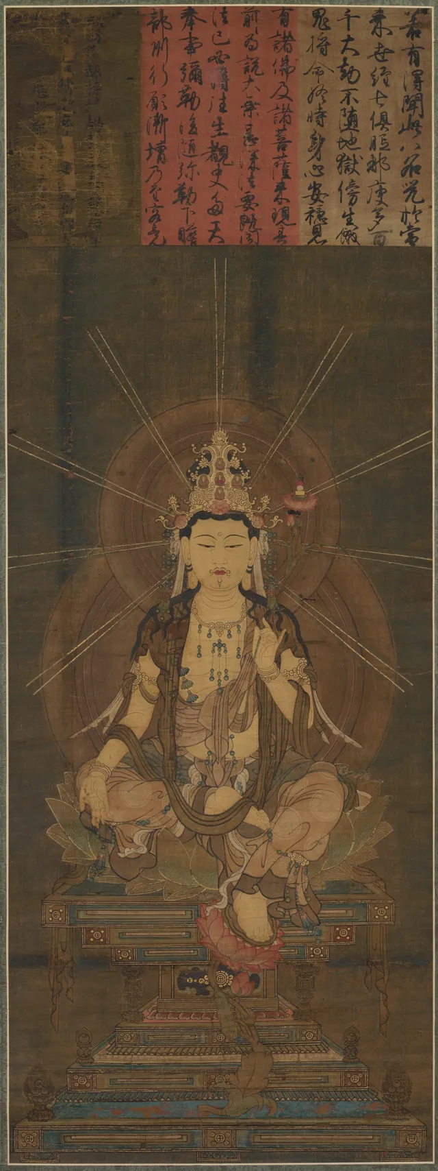 Standing frontal bodhisattva in gauzy robes and heavy jewelry, gold crown holding five small seated Buddhas, cut-gold patterning on the silk, three lines of inscription above the