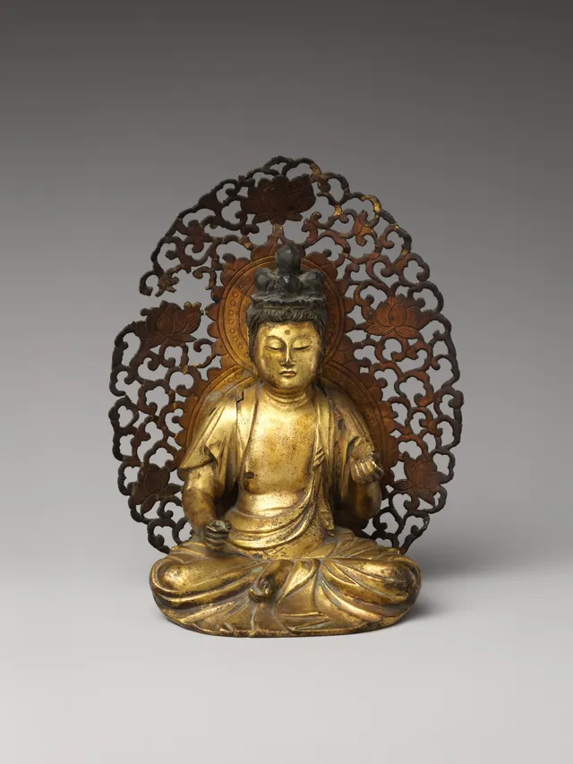 Kamakura late-13th-c. gilt-bronze seated Hachiji Monju, 16.5 cm. Eight discrete topknots around the cranium — the eight-syllable mantra form. Tangs on the back.